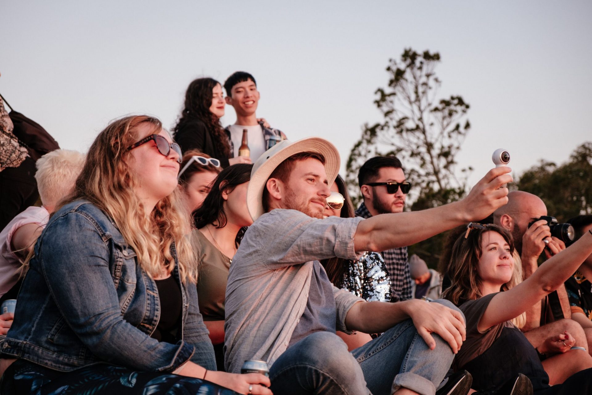 A group of friends enjoying a sunset.