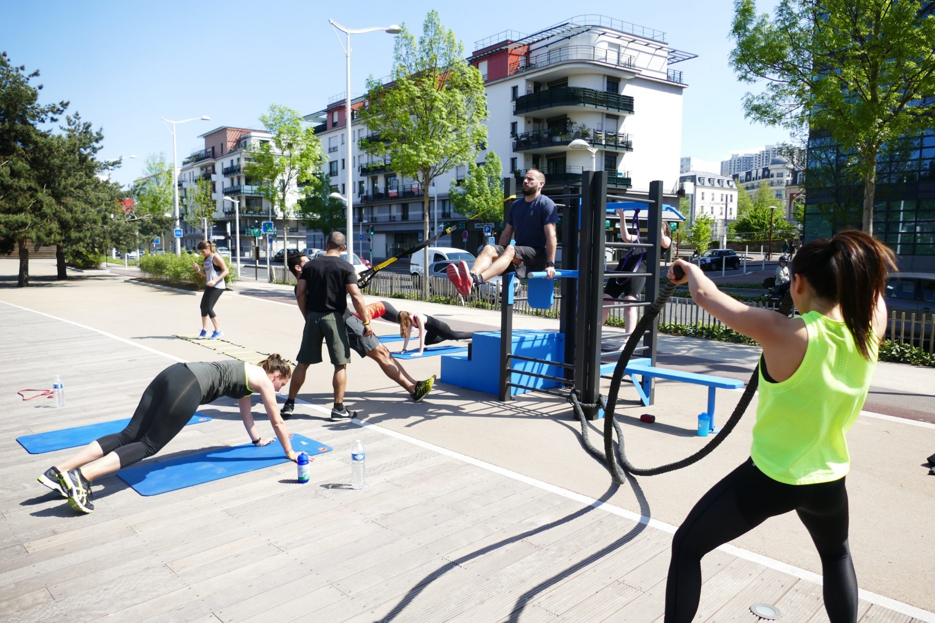 People of various ages participating in a bootcamp training session.