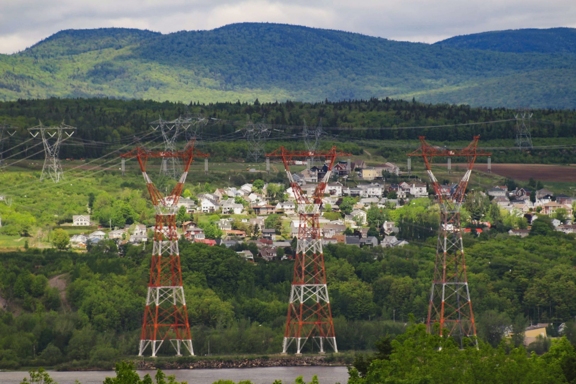 Electromagnetic harm could be cause by these high power towers looming over a small community in the mountains.