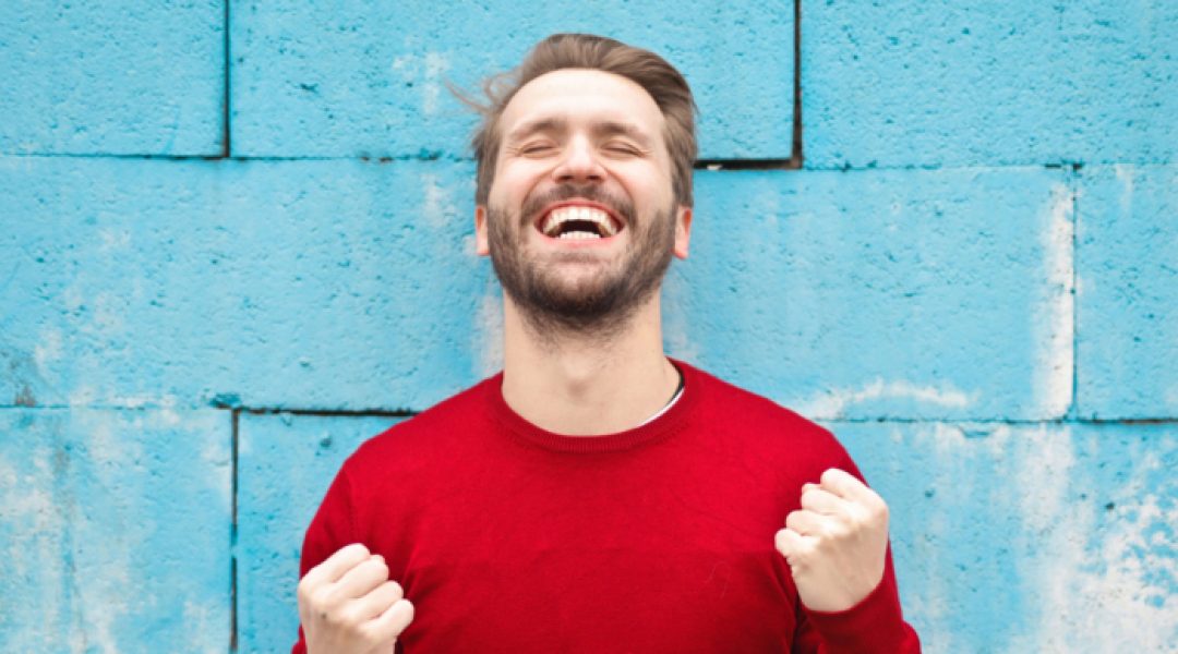 Man who's happy because he's pursuing optimal health.