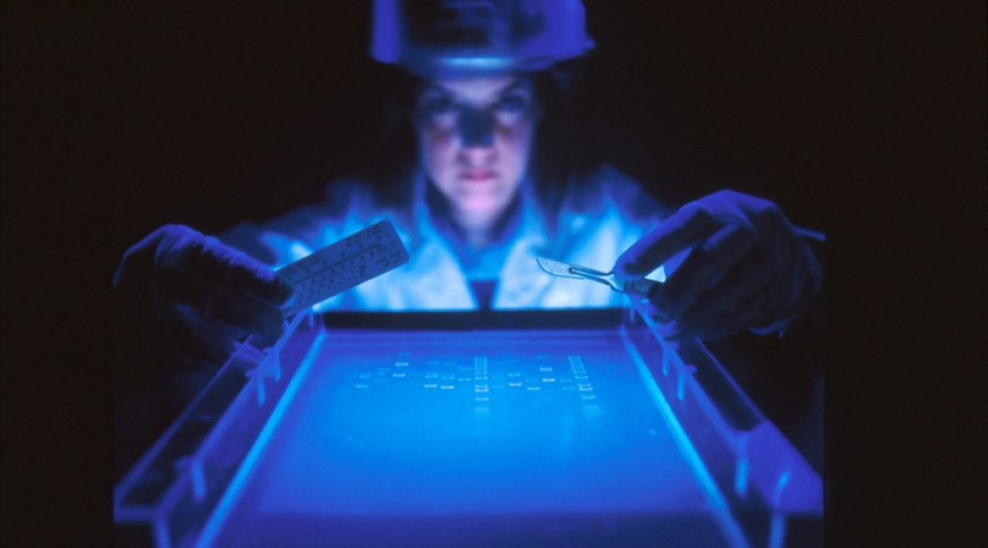 Woman with a face shield performing a common medical test.